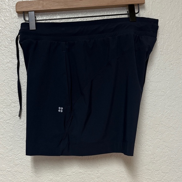 SWEATY BETTY Navy Blue Explorer 5.5” Shorts Size 8 - Picture 12 of 16